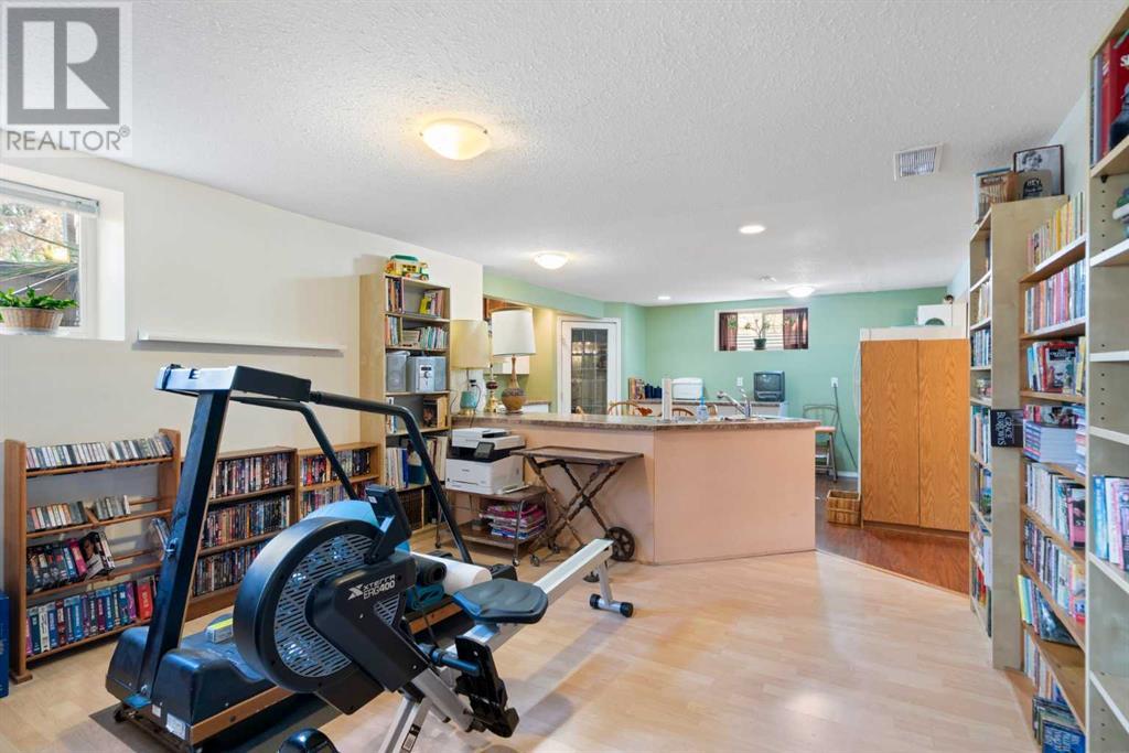 Single Family House Bungalow for Sale in  Queensland Circle SE Queensland Calgary 