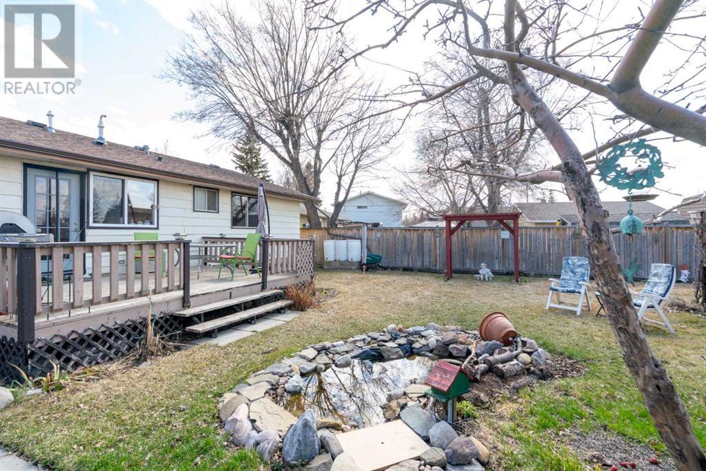 Single Family House Bungalow for Sale in  Queensland Circle SE Queensland Calgary 