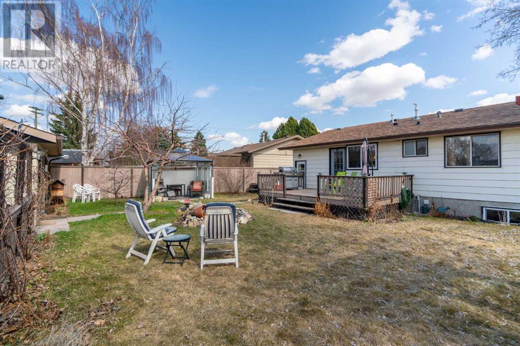 Single Family House Bungalow for Sale in  Queensland Circle SE Queensland Calgary 