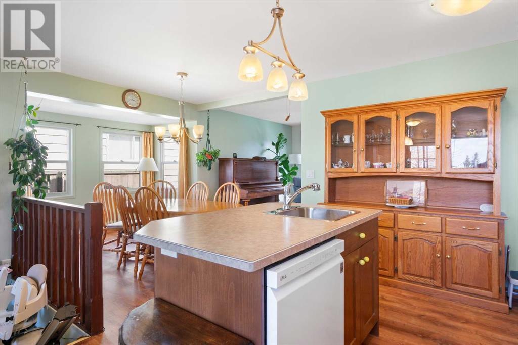 Single Family House Bungalow for Sale in  Queensland Circle SE Queensland Calgary 