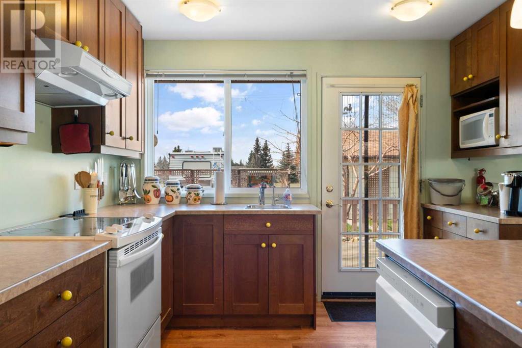 Single Family House Bungalow for Sale in  Queensland Circle SE Queensland Calgary 