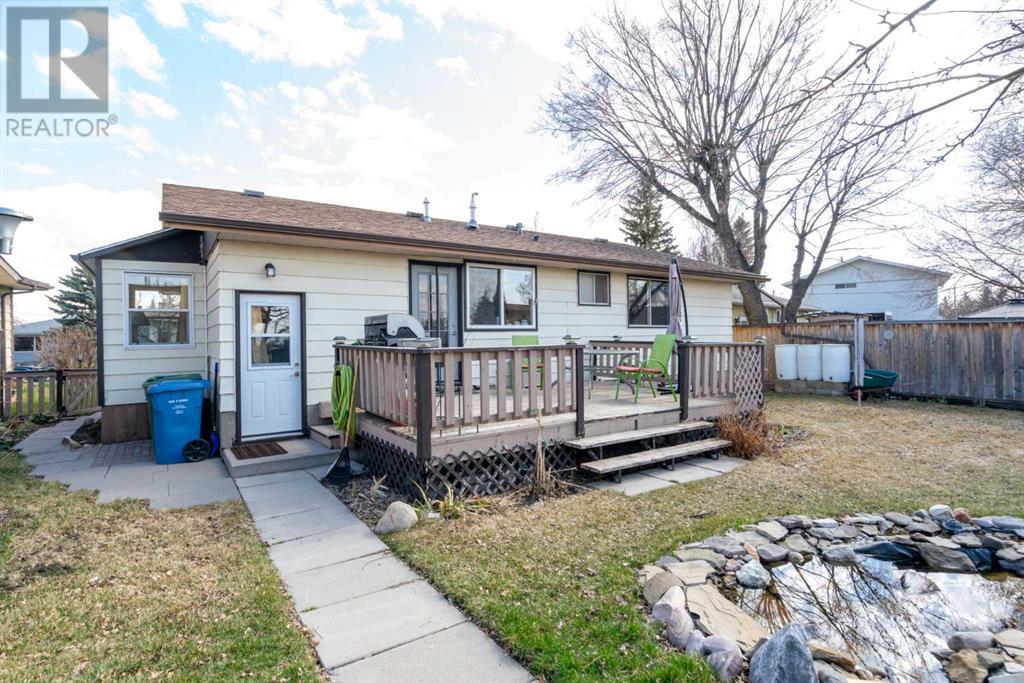 Single Family House Bungalow for Sale in  Queensland Circle SE Queensland Calgary 