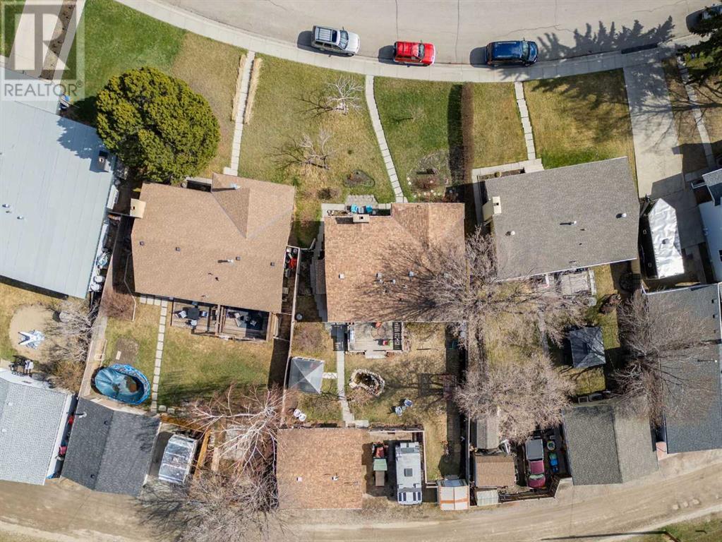 Single Family House Bungalow for Sale in  Queensland Circle SE Queensland Calgary 