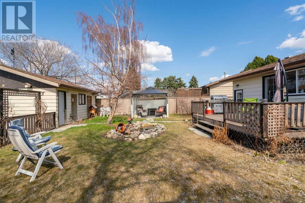 Single Family House Bungalow for Sale in  Queensland Circle SE Queensland Calgary 