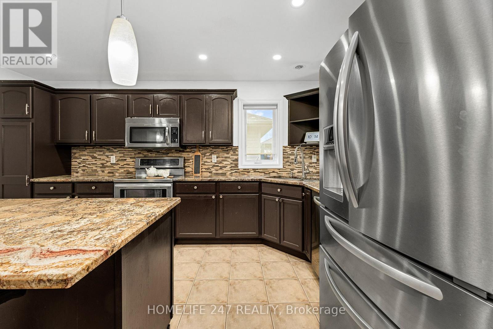 Photo 28 of 1119 Monarch Meadows Drive, Lakeshore ON