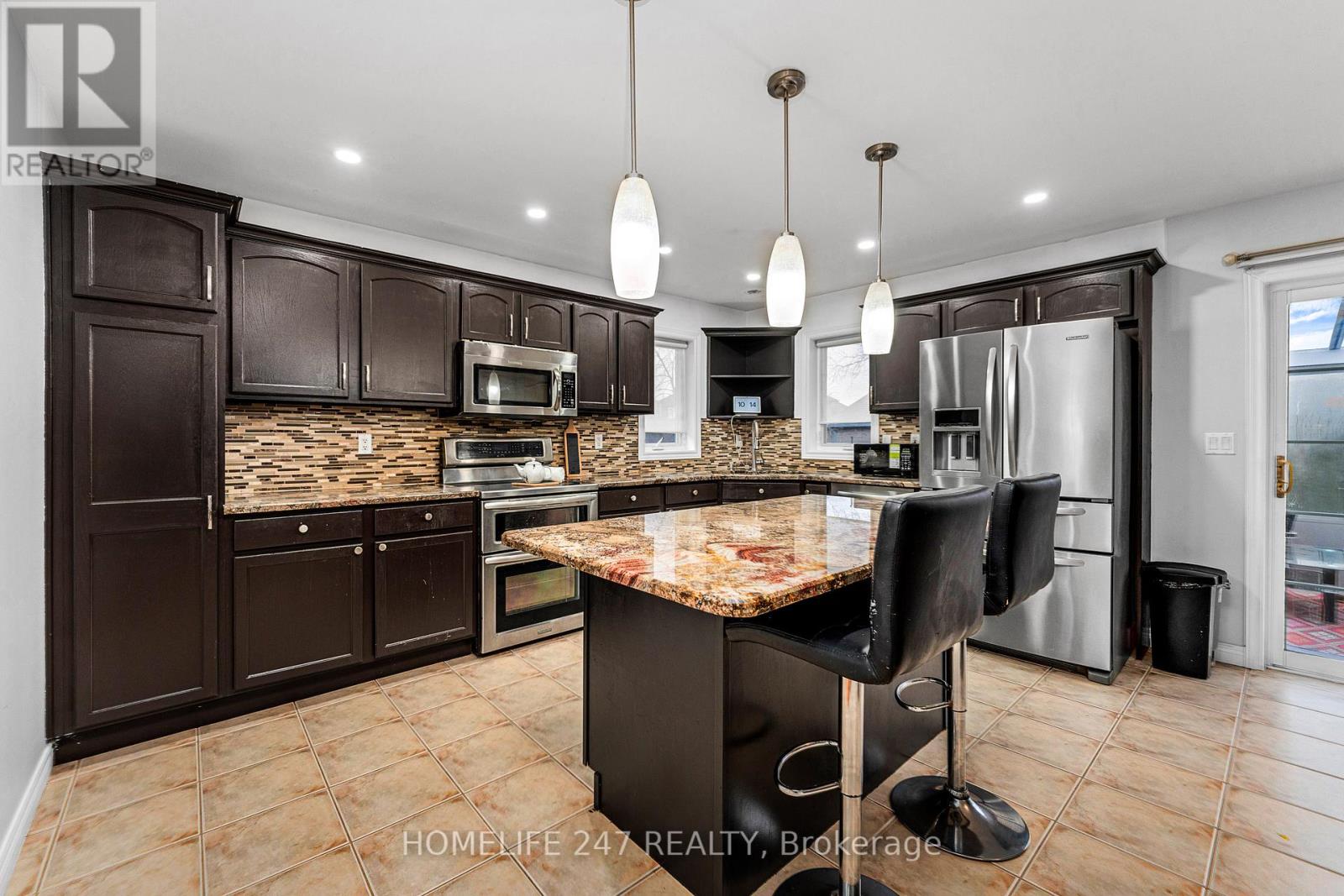 Photo 5 of 1119 Monarch Meadows Drive, Lakeshore ON