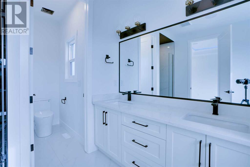 Single Family House for Sale in   Street SW Rosscarrock Calgary 