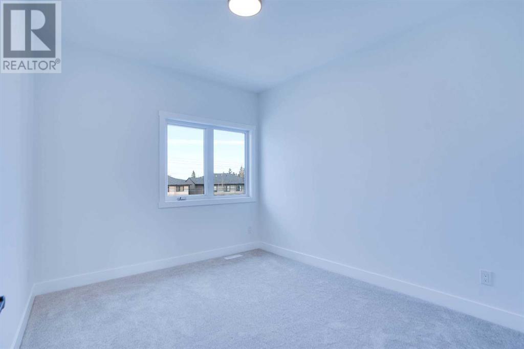 Single Family House for Sale in   Street SW Rosscarrock Calgary 