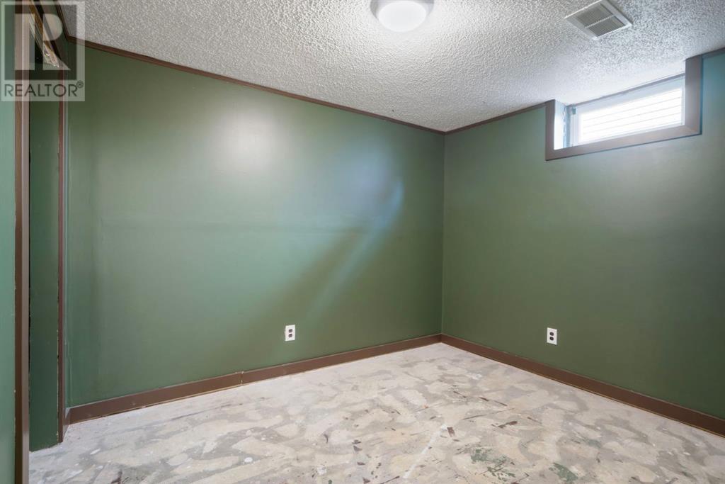 Single Family House Bungalow for Sale in  Midridge Drive SE Midnapore Calgary 
