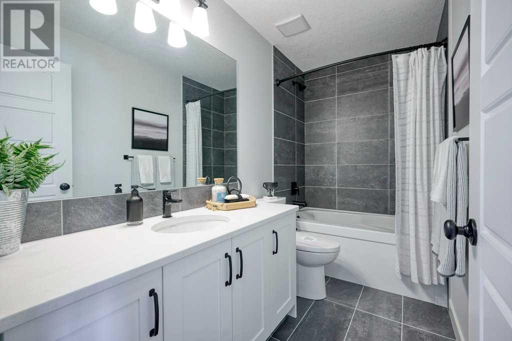 Photo 1 of 103 Wolf Creek Rise Se, Calgary AB