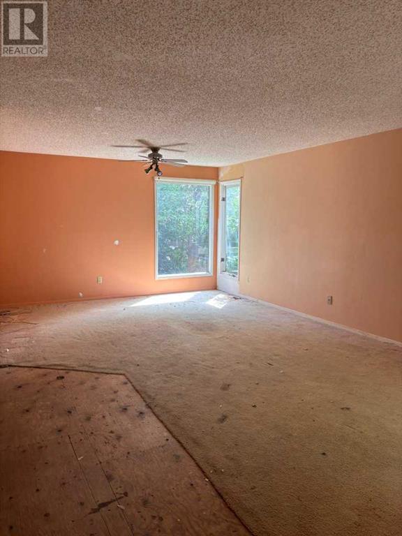 Single Family House 5 Level for Sale in  Deermoss Crescent SE Deer Run Calgary 