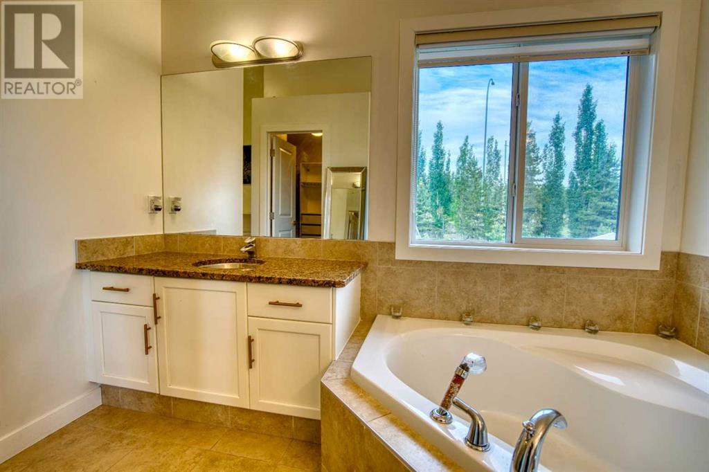 Photo 28 of 109 Aspen Stone Place Sw, Calgary AB