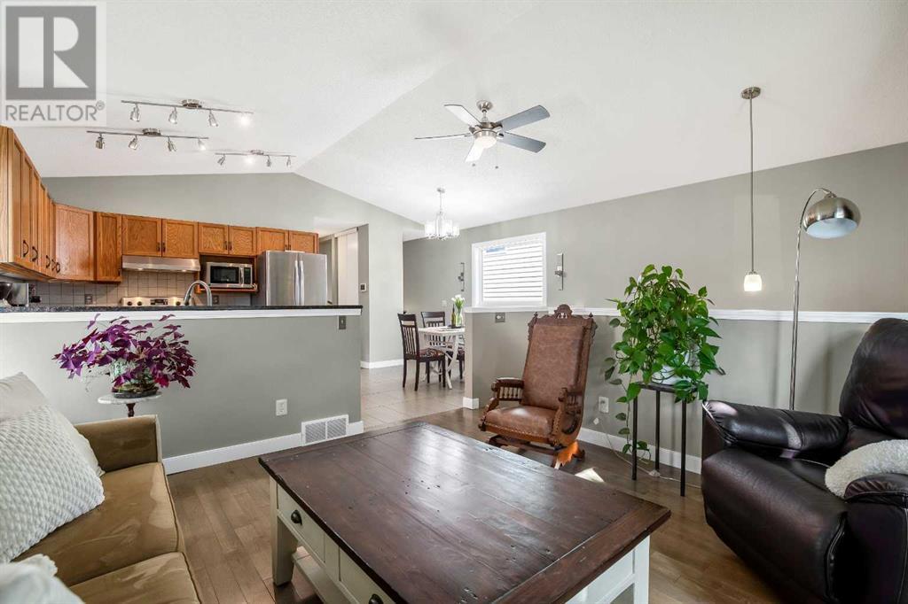 Single Family House Bi-level for Sale in  Arbour Wood Mews NW Arbour Lake Calgary 