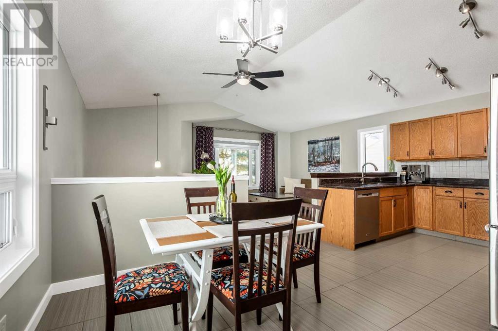 Single Family House Bi-level for Sale in  Arbour Wood Mews NW Arbour Lake Calgary 