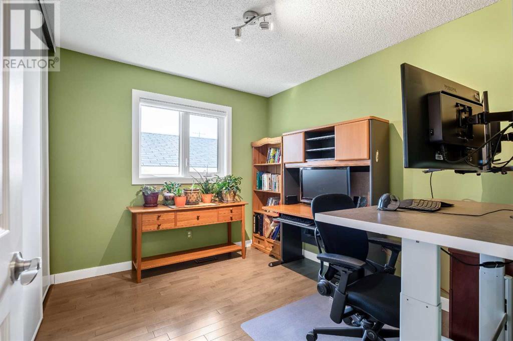 Single Family House Bi-level for Sale in  Arbour Wood Mews NW Arbour Lake Calgary 