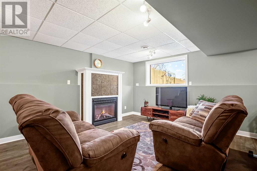 Single Family House Bi-level for Sale in  Arbour Wood Mews NW Arbour Lake Calgary 