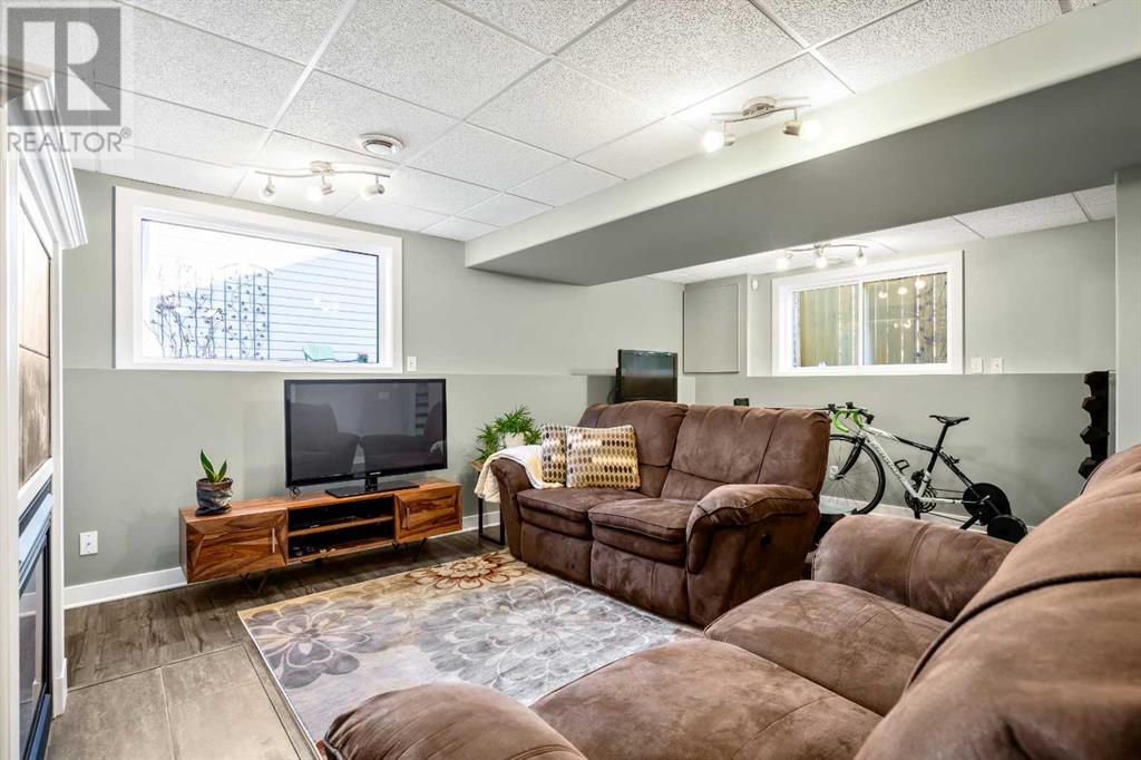 Single Family House Bi-level for Sale in  Arbour Wood Mews NW Arbour Lake Calgary 