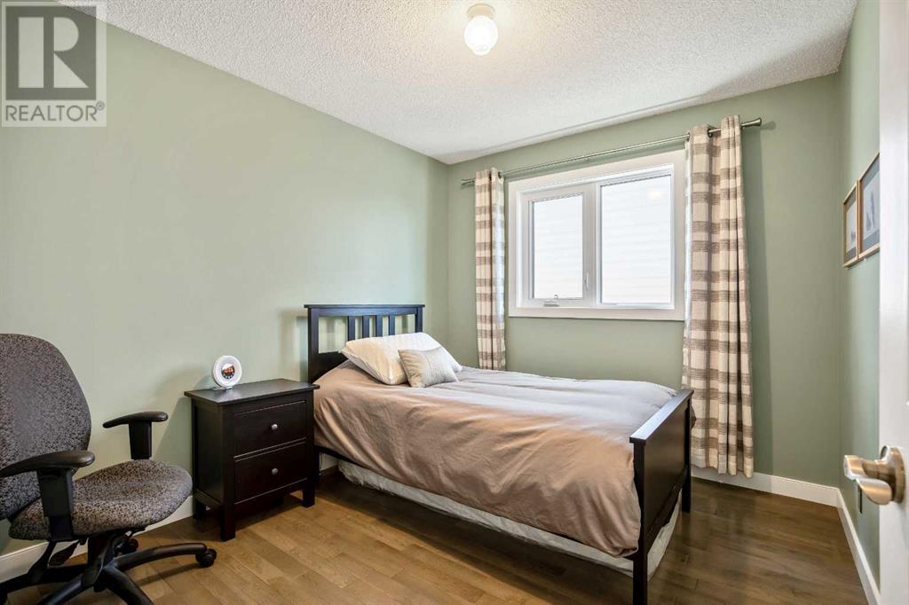 Single Family House Bi-level for Sale in  Arbour Wood Mews NW Arbour Lake Calgary 