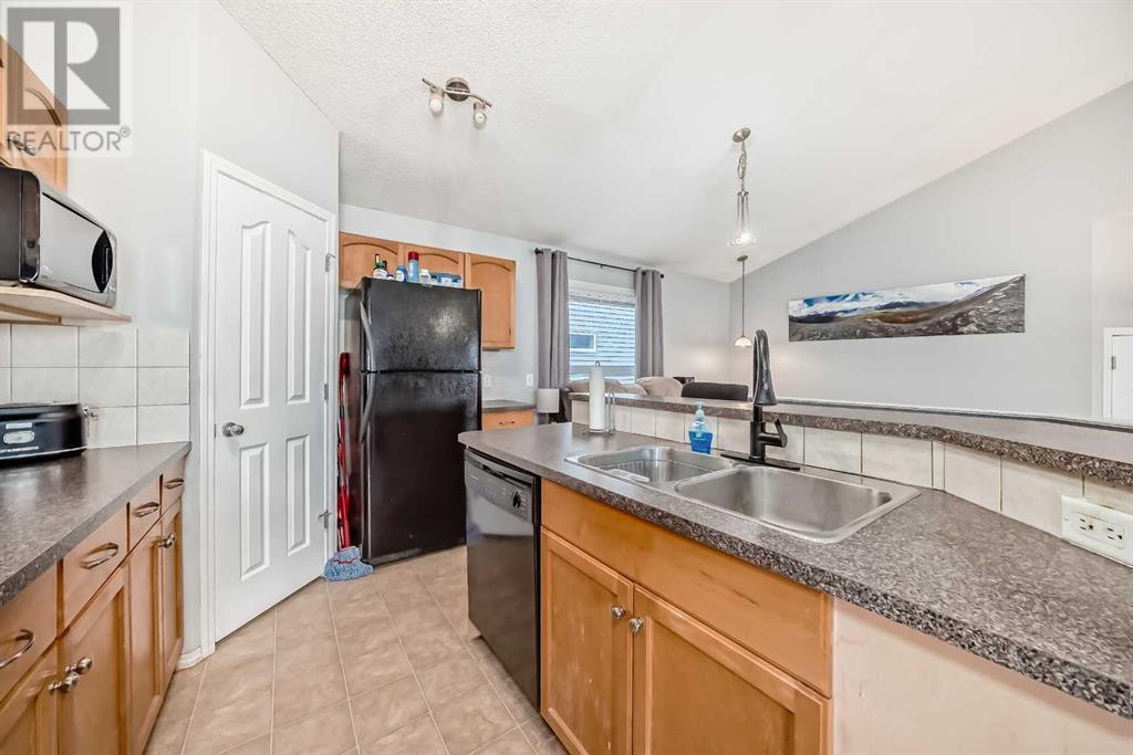 Single Family House Bungalow for Sale in  Royal Birch Mews NW Royal Oak Calgary 