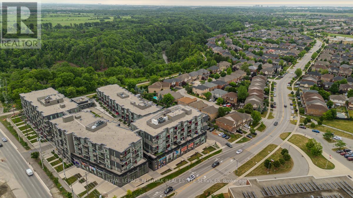 Photo 3 of C 320 5260 Dundas Street, Burlington ON