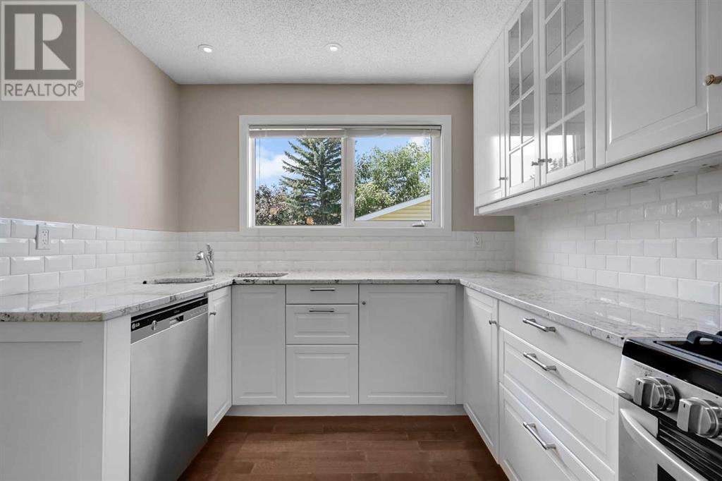 Single Family House Bungalow for Sale in  Woodbrook Way SW Woodbine Calgary 