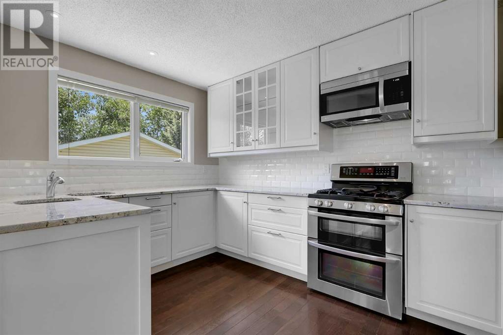 Single Family House Bungalow for Sale in  Woodbrook Way SW Woodbine Calgary 