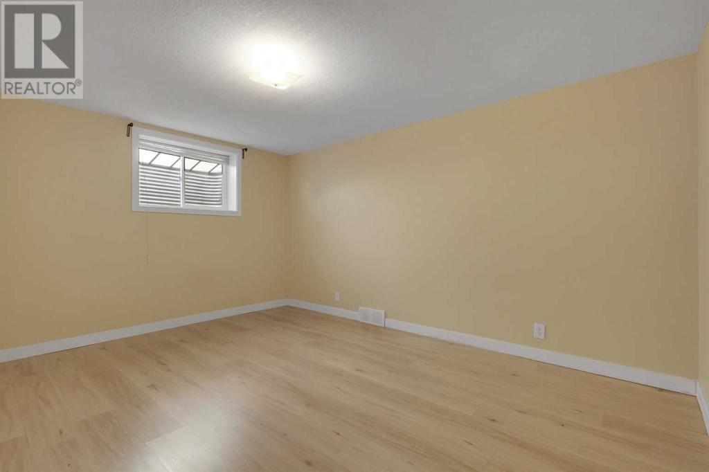 Single Family House Bungalow for Sale in  Woodbrook Way SW Woodbine Calgary 