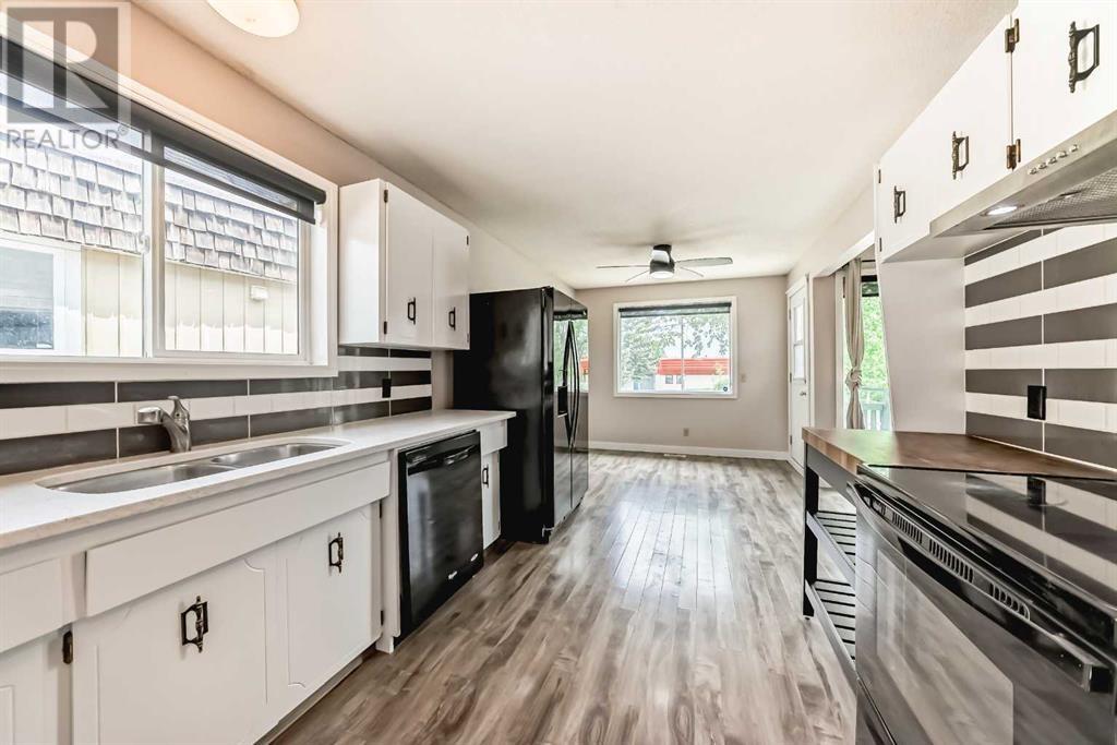 Single Family House Bi-level for Sale in   Street NW Dalhousie Calgary 