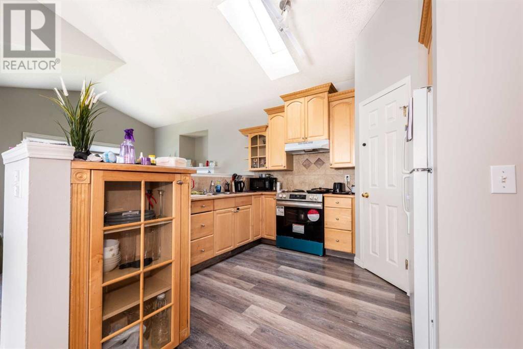 Single Family House 4 Level for Sale in  Erin Circle SE Erin Woods Calgary 