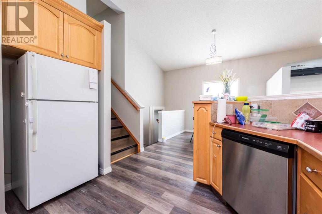 Single Family House 4 Level for Sale in  Erin Circle SE Erin Woods Calgary 