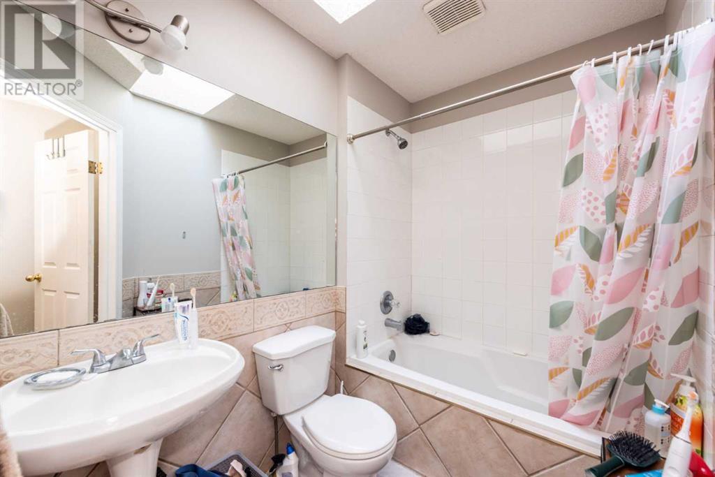 Single Family House 4 Level for Sale in  Erin Circle SE Erin Woods Calgary 