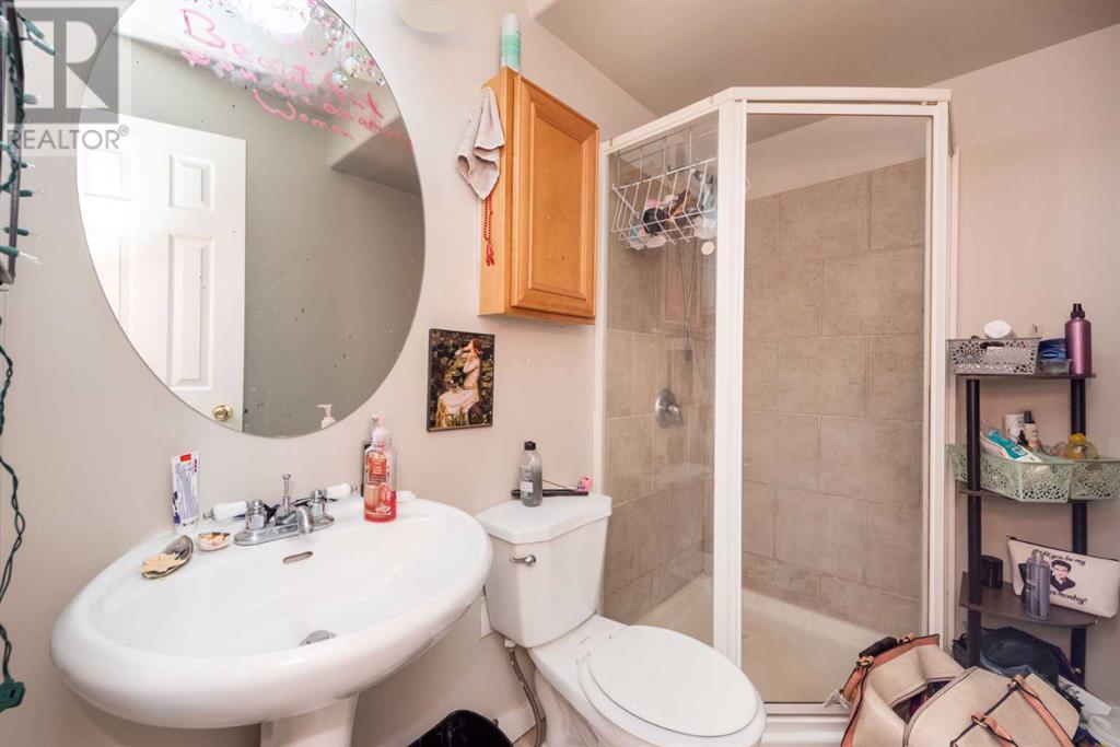 Single Family House 4 Level for Sale in  Erin Circle SE Erin Woods Calgary 