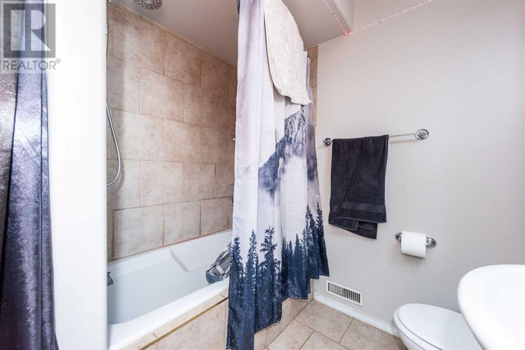 Single Family House 4 Level for Sale in  Erin Circle SE Erin Woods Calgary 