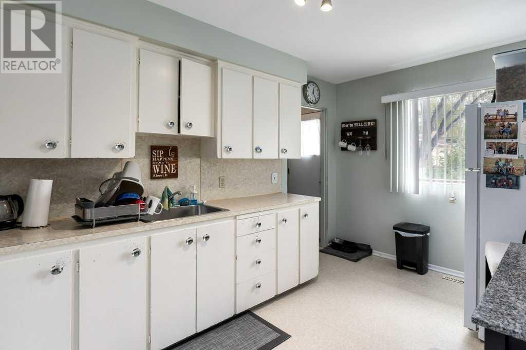 Multi-family House Bungalow for Sale in   Street SW Glenbrook Calgary 