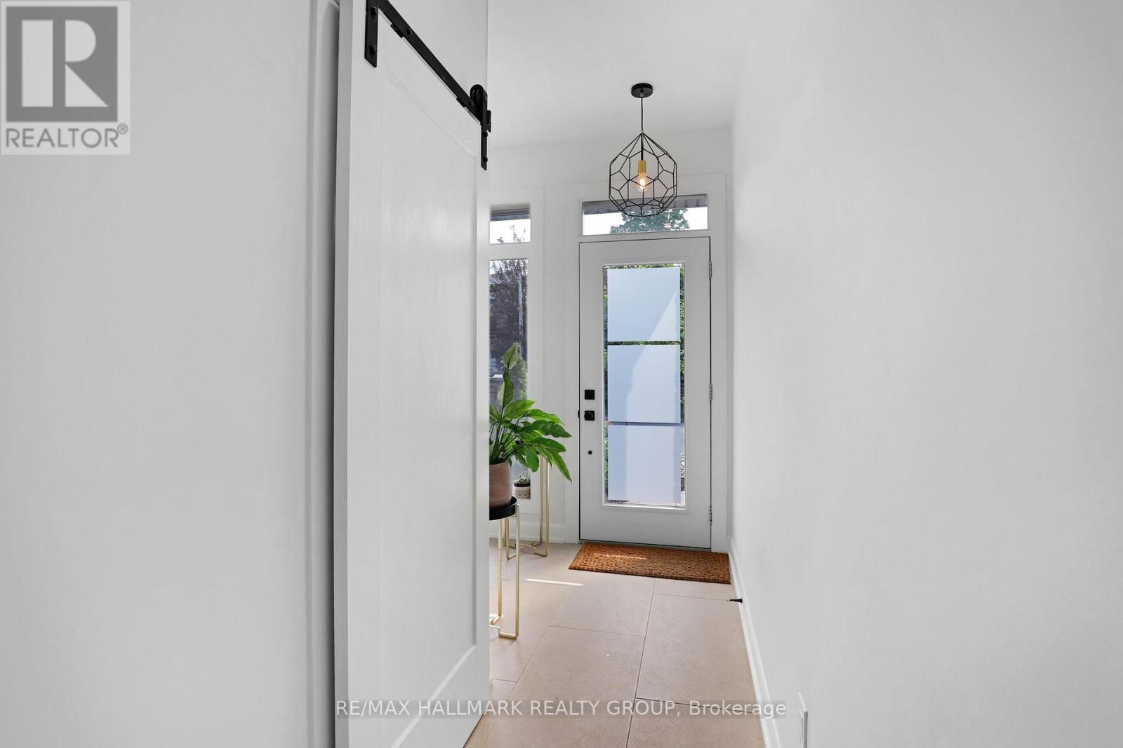 Mudroom adjacent to garage & front entry ways
