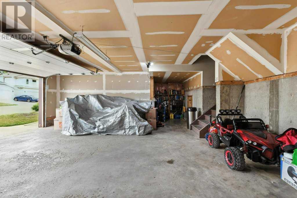 Single Family House 3 Level for Sale in  Macewan Ridge Place NW MacEwan Glen Calgary 