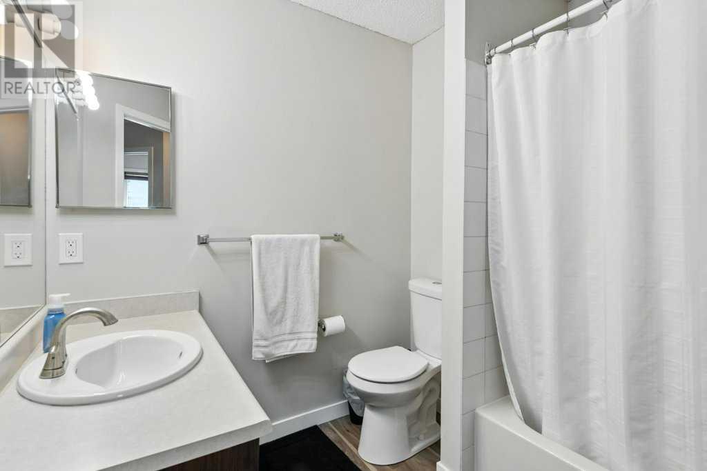 Single Family House 3 Level for Sale in  Macewan Ridge Place NW MacEwan Glen Calgary 