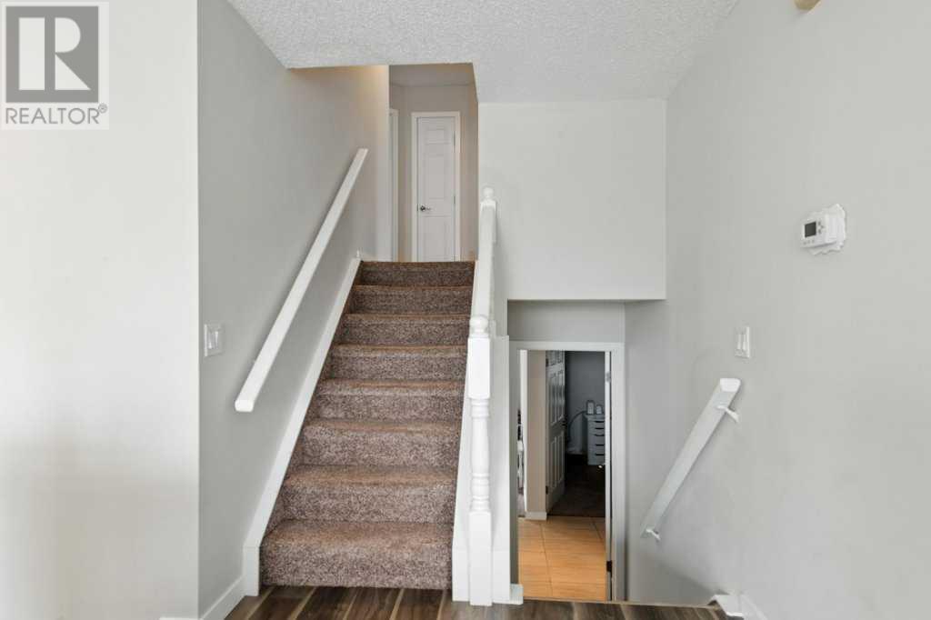 Single Family House 3 Level for Sale in  Macewan Ridge Place NW MacEwan Glen Calgary 