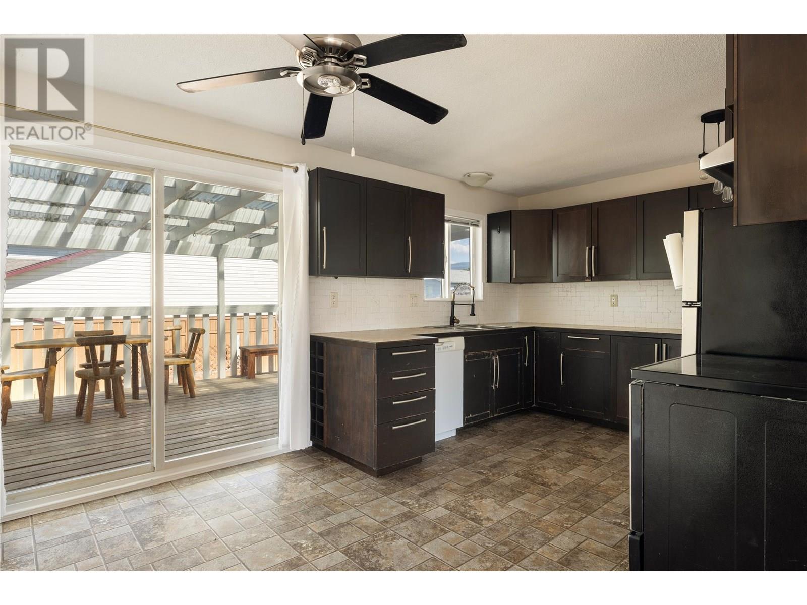Photo 12 of 415 Gerstmar Road, Kelowna BC