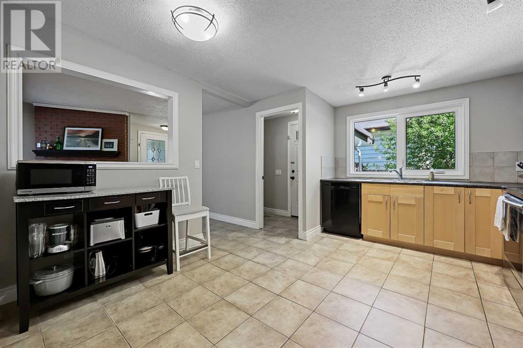 Single Family House Bungalow for Sale in  Dalrymple Crescent NW Dalhousie Calgary 