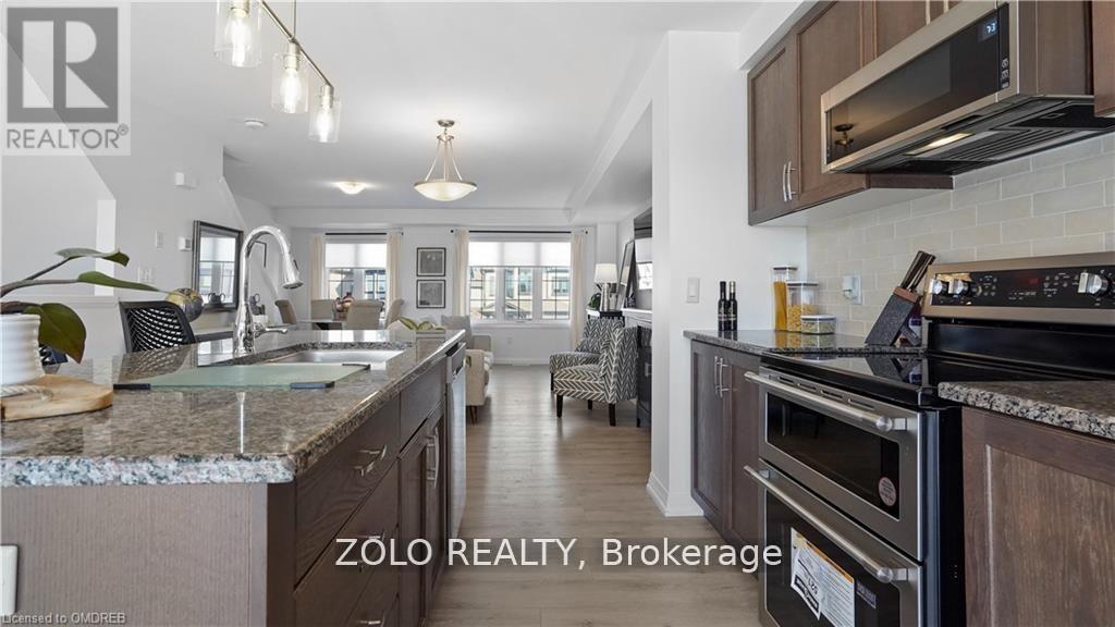 Photo 1 of 106 Monarch Woods Drive, Kitchener ON