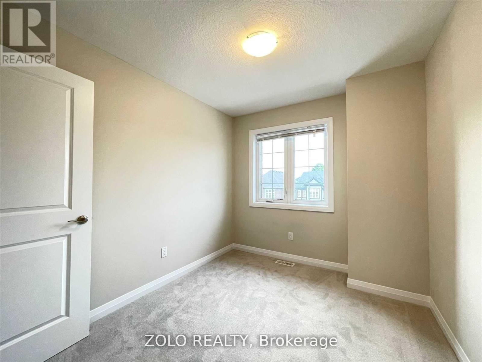 Photo 5 of 106 Monarch Woods Drive, Kitchener ON