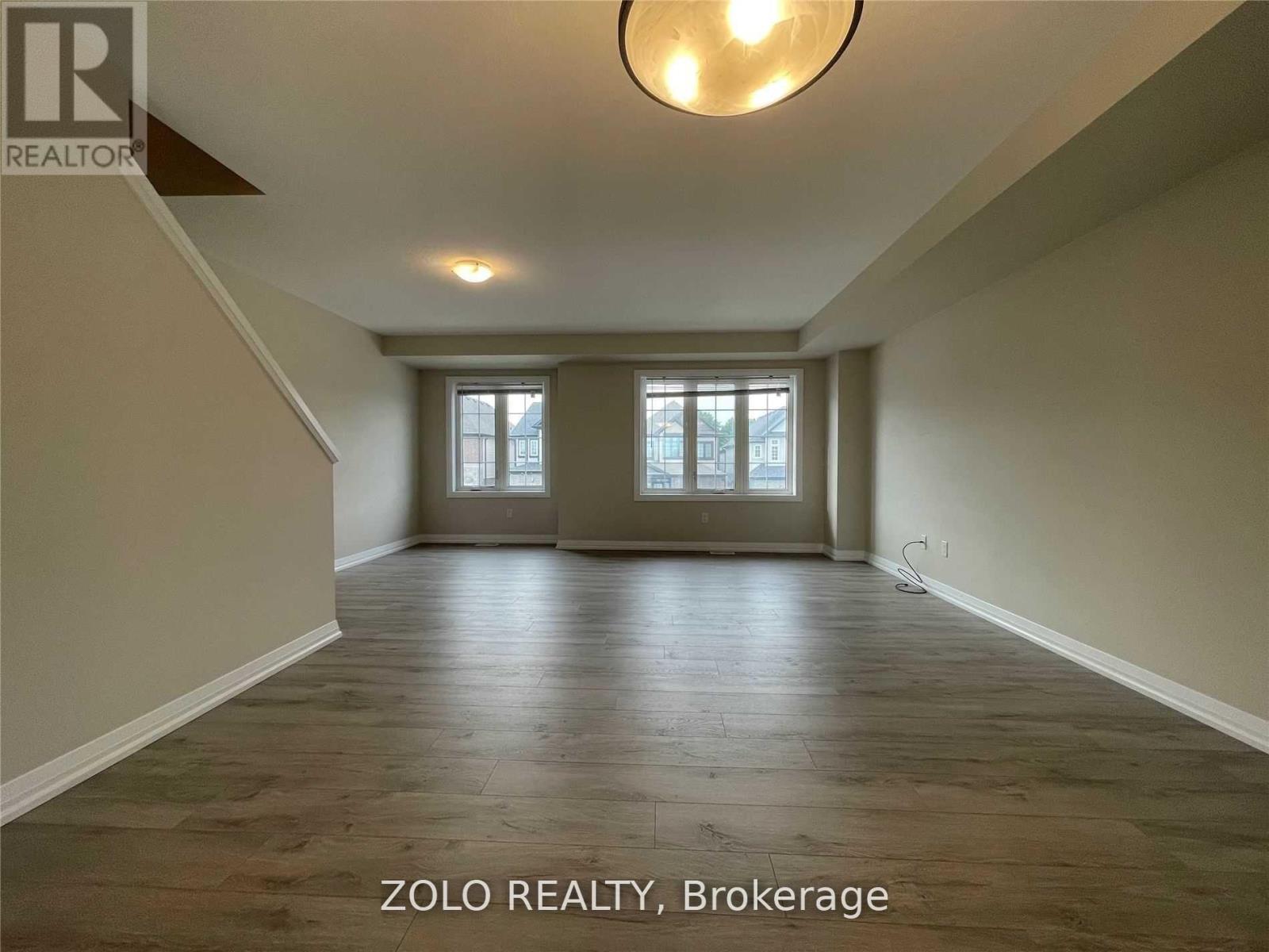 Photo 11 of 106 Monarch Woods Drive, Kitchener ON