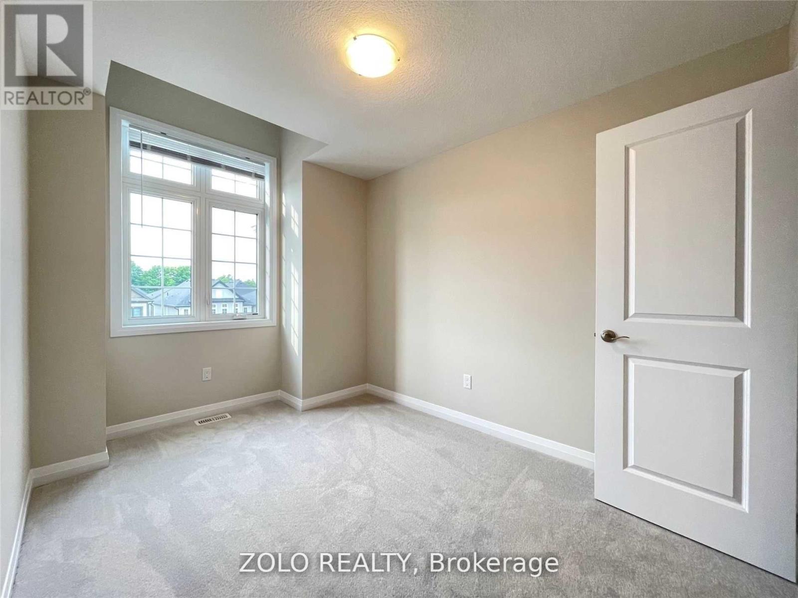 Photo 21 of 106 Monarch Woods Drive, Kitchener ON