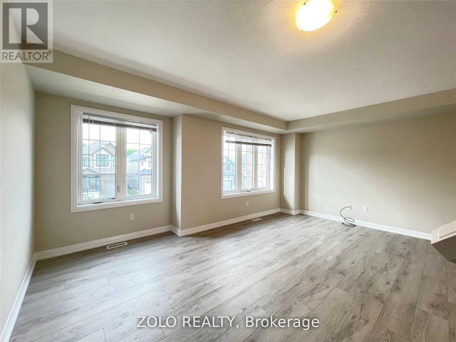 Photo 15 of 106 Monarch Woods Drive, Kitchener ON