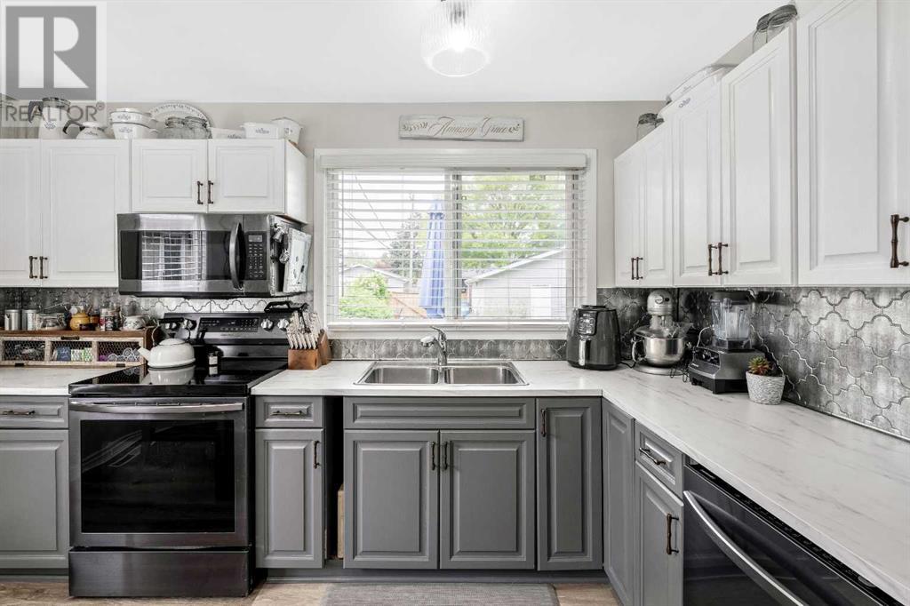 Single Family House 4 Level for Sale in  Addison Place SE Acadia Calgary 