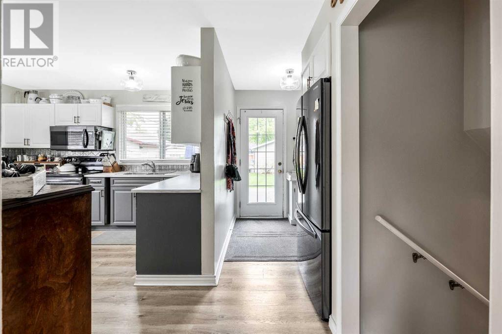 Single Family House 4 Level for Sale in  Addison Place SE Acadia Calgary 