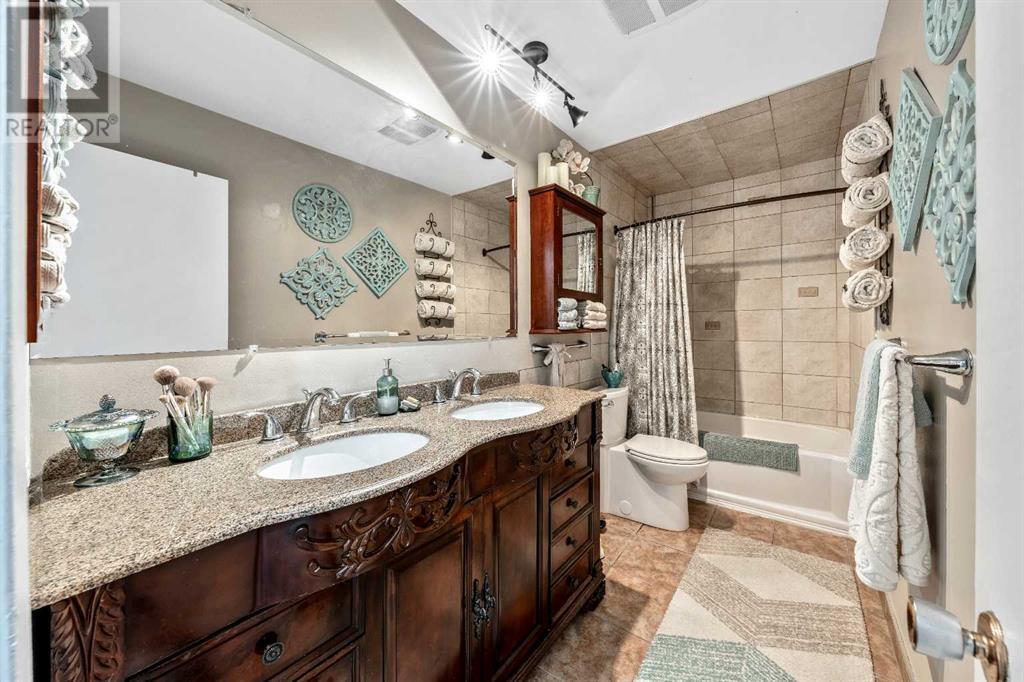 Single Family House 4 Level for Sale in  Addison Place SE Acadia Calgary 