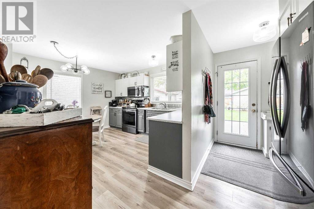 Single Family House 4 Level for Sale in  Addison Place SE Acadia Calgary 