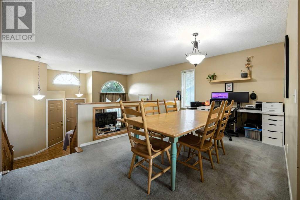 Single Family House 3 Level for Sale in  Riverstone Close SE Riverbend Calgary 